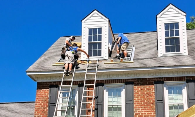 roof with three laborers